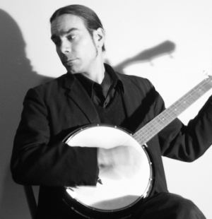 A photograph of Hunter Robertson playing banjo.