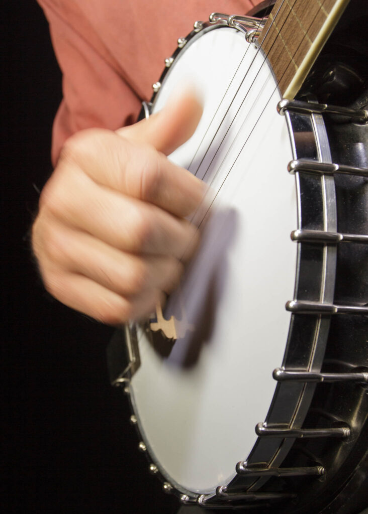 Hunter Robertson playing clawhammer banjo